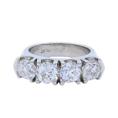 MID-CENTURY PLATINUM FOUR-STONE DIAMOND RING: Mid-Century Platinum Four-Stone Diamond Ring ES AOOO Product details: MATERIALS: Platinum GEMSTONE: Diamond WEIGHT: 12.7 Grams RING SIZE: 5.75 HALLMARKS: PLAT ITEM DETAILS: Mid-Century Platinum Four-S