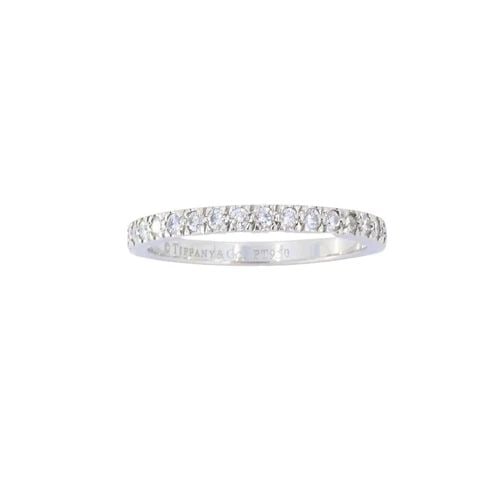 VINTAGE TIFFANY & CO. DIAMOND BAND PLATINUM SIZE 5.5 (51): VINTAGE TIFFANY & CO. DIAMOND BAND PLATINUM SIZE 5.5 (51) Vintage Tiffany & Co. Diamond Band Platinum Size 5.5 (51) This classic Tiffany & Co. band ring is made of platinum and set with a row of round