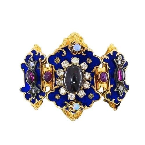 ANTIQUE VICTORIAN 14K GOLD GEMSTONE ENAMEL BUCKLE: ANTIQUE VICTORIAN 14K GOLD GEMSTONE ENAMEL BUCKLE ES JETO Product details: MATERIALS: 14k Gold, Enamel GEMSTONE: Garnet, Diamond, Opal WEIGHT: 26.3 Grams MEASUREMENTS: 1 1/2" x 1 5/8" ITEM DETAILS: An