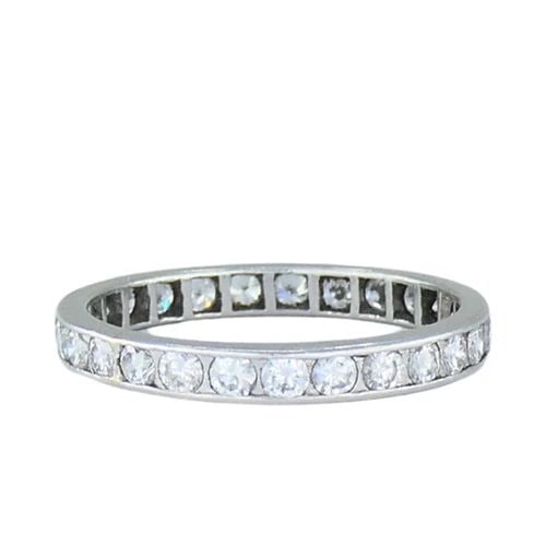 WEDDING BAND PLATINUM DIAMOND ETERNITY RING 1960S ESTATE JEWELRY: WEDDING BAND PLATINUM DIAMOND ETERNITY RING 1960S ESTATE JEWELRY ROO Platinum Diamond Eternity Band Ring A wedding band made of platinum, featuring diamonds. This vintage circa 1960s eternity ring has