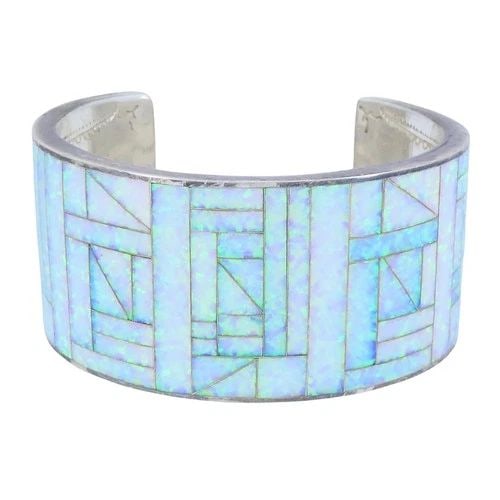 VINTAGE STERLING SILVER OPAL INLAY CUFF BRACELET, SIGNED JLS: VINTAGE STERLING SILVER OPAL INLAY CUFF BRACELET, SIGNED JLS KL EOO This vintage sterling silver opal inlay cuff bracelet dates to the 1970s and features a wide geometric mosaic design across the fron
