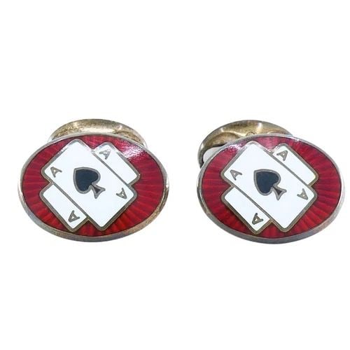 DEAKIN & FRANCIS SILVER CUFFLINKS ENAMEL ACE OF SPADES: DEAKIN & FRANCIS SILVER CUFFLINKS ENAMEL ACE OF SPADES Product details: DESIGNER: Deakin & Francis CIRCA: 1980’s MATERIALS: 925 Silver, Enamel WEIGHT: 16 Grams MEASUREMENTS: 1/2" x 3/4" Length - 1" 