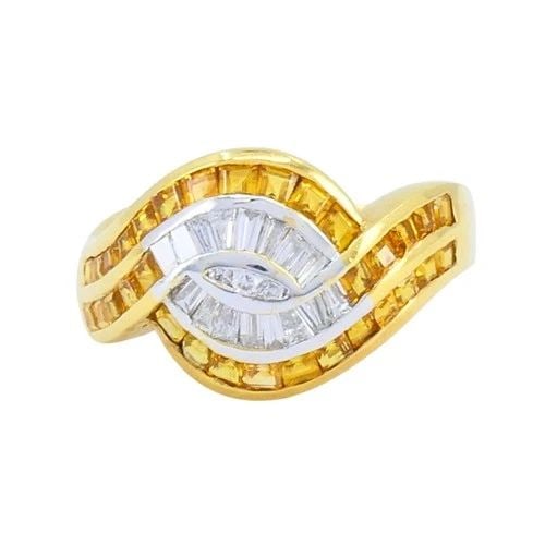 VINTAGE FRENCH 18K GOLD DIAMOND CITRINE RING: VINTAGE FRENCH 18K GOLD DIAMOND CITRINE RING KL ITO This French 18k gold ring features a distinctive wave motif set with tapered baguette diamonds at the center and channel-set baguette citrines along