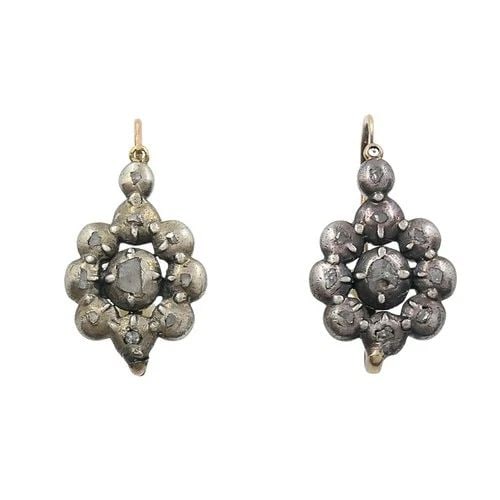 GEORGIAN SILVER FLORAL DIAMOND CLUSTER EARRINGS 14K GOLD EAR WIRES, 1830S: GEORGIAN SILVER FLORAL DIAMOND CLUSTER EARRINGS 14K GOLD EAR WIRES, 1830S Materials Silver, 14k Gold Gemstone Diamond Weight 4.2 Grams Measurement 7/16" x 3/4" ITEM DETAILS Georgian Silver Floral Diam
