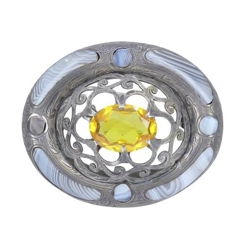 ANTIQUE VICTORIAN STERLING SILVER AGATE BROOCH PENDANT: ANTIQUE VICTORIAN STERLING SILVER AGATE BROOCH PENDANT KL ITO This Victorian Scottish brooch pendant is crafted in silver and designed with the bold ornamental character associated with 19th century S