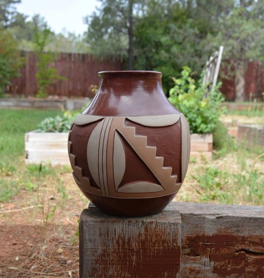 DOMINGUITA SISNEROS AND TOMASITA R. MONTOYA - LARGE DEEPLY CARVED POLYCHROME POT: DOMINGUITA SISNEROS AND TOMASITA R. MONTOYA - LARGE DEEPLY CARVED POLYCHROME POT This large pot has been beautifully crafted by San Juan potters Dominguita Sisneros and her mother Tomasita Reyes Monto