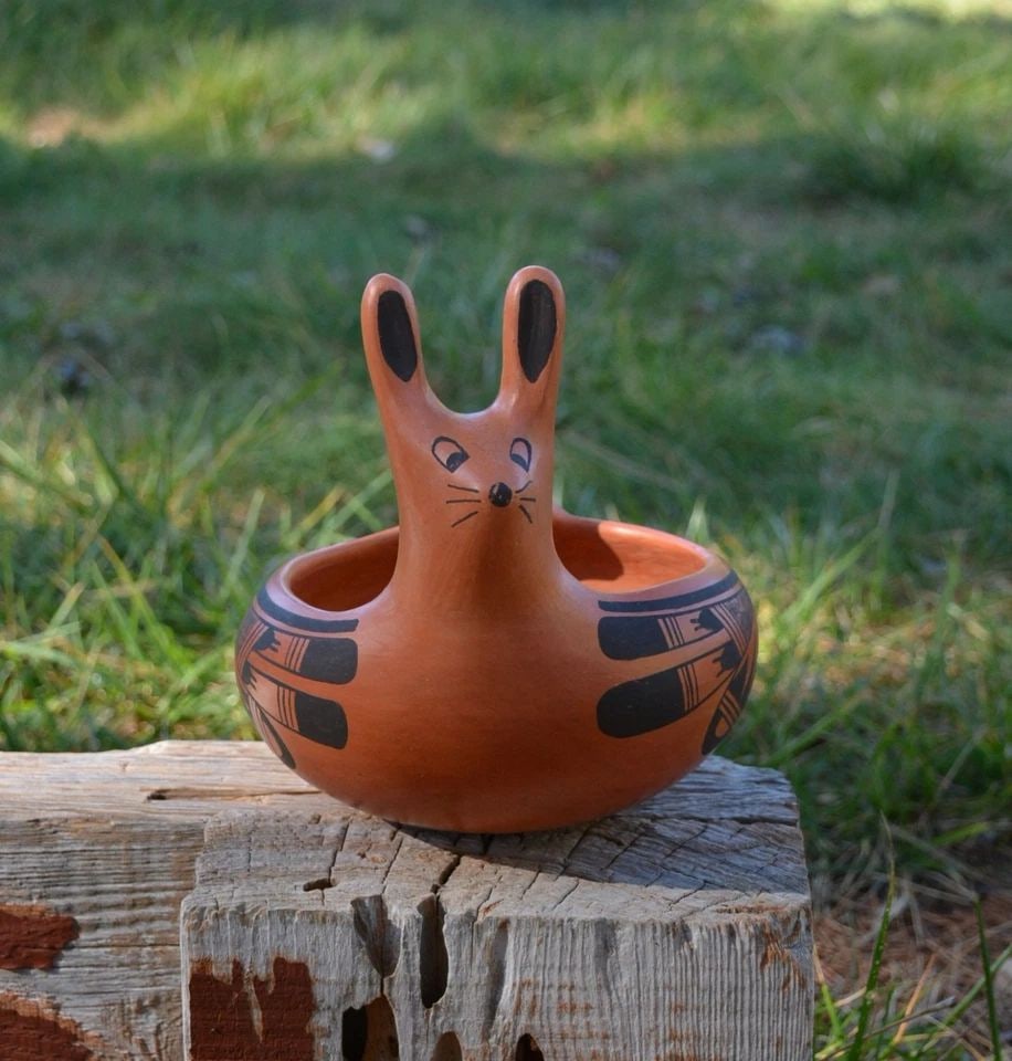 EVELYN POOLHECO 1916-1989 -RARE HOPI RABBIT POT W HOPI SYMBOLS - 7.5" TALL: EVELYN POOLHECO 1916-1989 -RARE HOPI RABBIT POT W HOPI SYMBOLS - 7.5" TALL This rare and delightful "rabbit pot" was created by Hopi potter Evelyn Poolheco. It measures 7 3/4" tall by 7 1/2" across (n