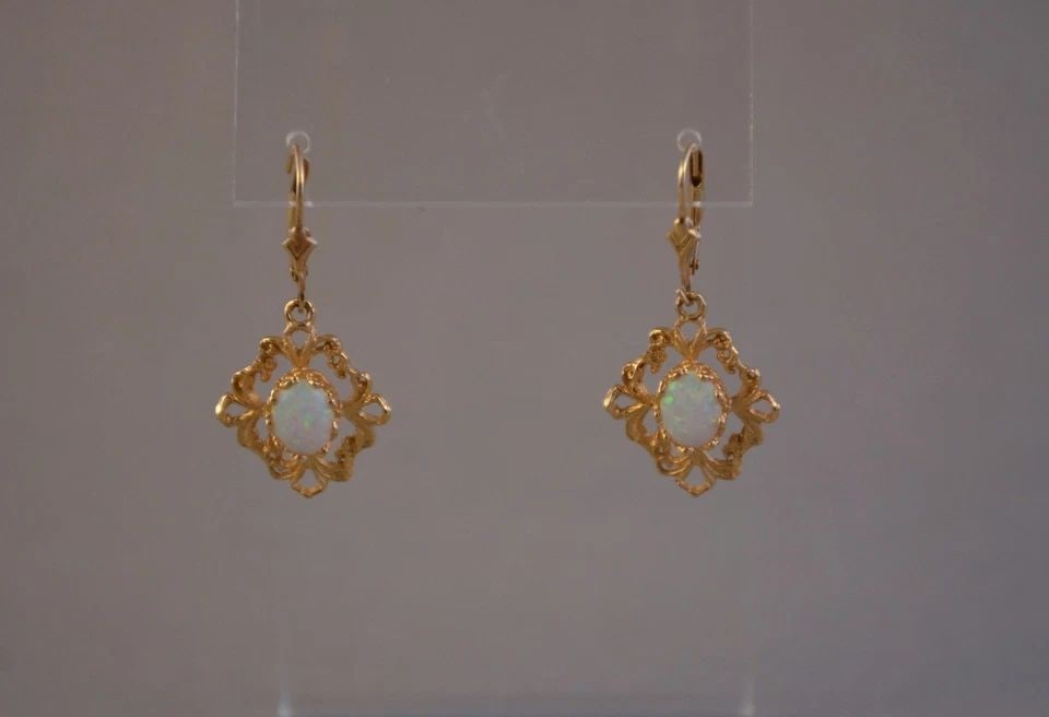VINTAGE SOLID 14K YELLOW GOLD DANGLE EARRINGS - OPAL - 1 3/8" DROP: VINTAGE SOLID 14K YELLOW GOLD DANGLE EARRINGS - OPAL - 1 3/8" DROP Item Description: This pair of vintage earrings have opals set into beautiful 14K solid gold settings. The earring pendants measure 3