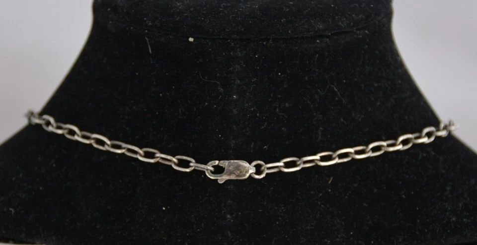 VINTAGE STERLING SILVER 14 KARAT GOLD CHOKER LINK NECKLACE - PUEBLO - 17 3/4": This vintage Navajo necklace has been beautifully crafted of sterling silver with solid 14 karat yellow gold overlay. The handmade chain has 3 panels showing a pueblo and kokopelli figures. The neckla