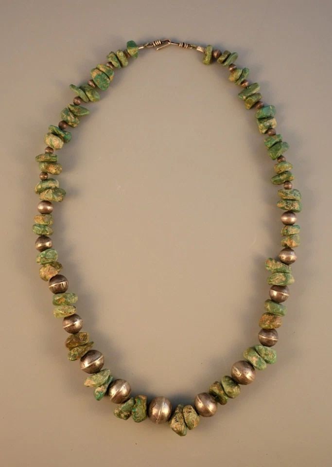 OLD PAWN NAVAJO INDIAN ROYSTON TURQUOISE NUGGET & STAMPED SILVER BEADS 24.5: OLD PAWN NAVAJO INDIAN ROYSTON TURQUOISE NUGGET & STAMPED SILVER BEADS 24.5 Item Description: This great old Navajo necklace has stamped Sterling silver beads with turquoise nuggets. The turquoise loo