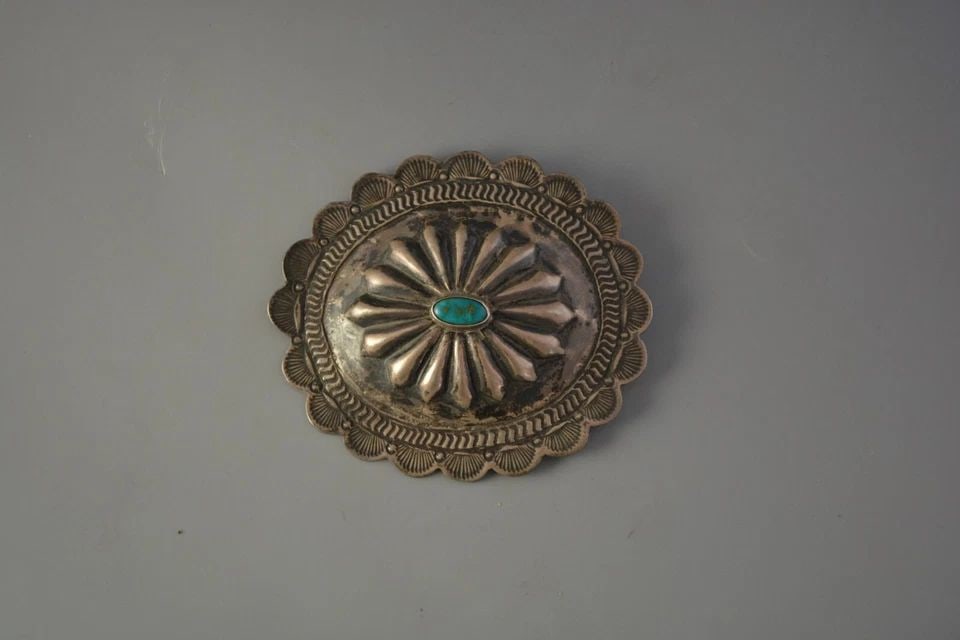 OLD PAWN NAVAJO INDIAN SILVER HAND STAMPED CONCHO BARRETTE - TURQUOISE - 3 1/4": OLD PAWN NAVAJO INDIAN SILVER HAND STAMPED CONCHO BARRETTE - TURQUOISE - 3 1/4" This beautifully crafted Navajo concho barrette is set with a wonderful turquoise stone. It measures 3 5/8" across by 3"