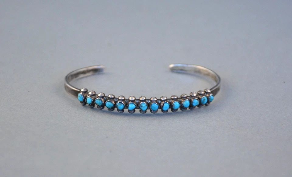 OLD PAWN ZUNI STERLING SILVER TURQUOISE ROW BRACELET - SIZE 6 1/4": This vintage sterling silver Zuni turquoise row bracelet has been beautifully crafted. The bracelet weighs 9.92 grams. The size is 5 1/4" around the inside plus an additional 1" opening at the back fo