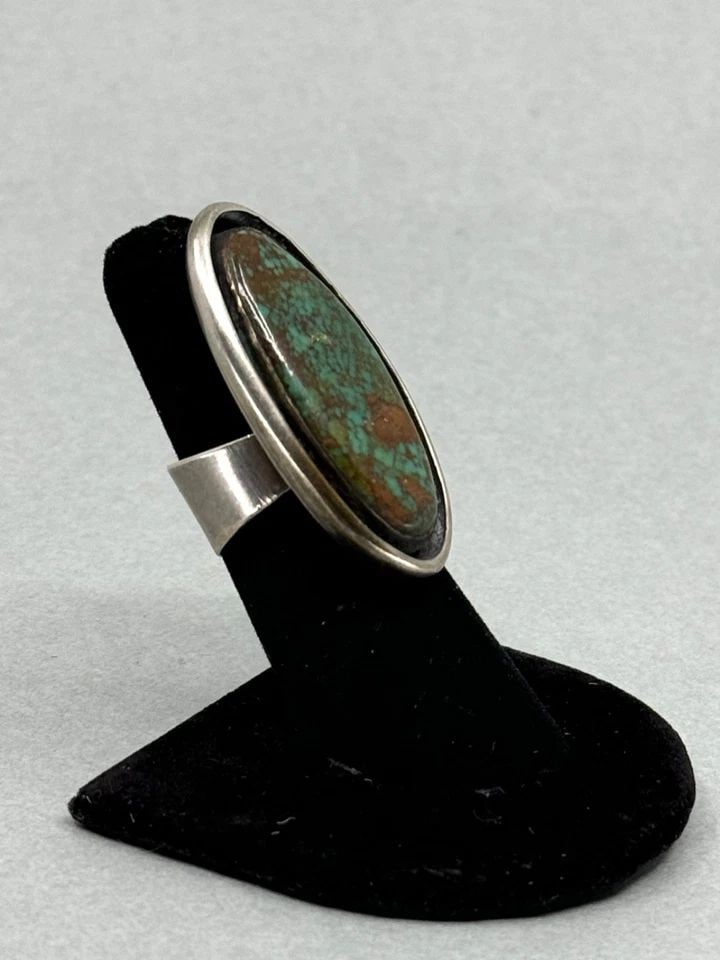 OLD PAWN SILVER RING - LARGE GEM QUALITY TURQUOISE - 1.7" TALL - SZ 7 1/4: OLD PAWN SILVER RING - LARGE GEM QUALITY TURQUOISE - 1.7" TALL - SZ 7 1/4 Old Pawn Sterling Silver Ring with large gem quality Turquoise. Signed. Size 7 1/4 1.7" tall. This ring is in great vintage co