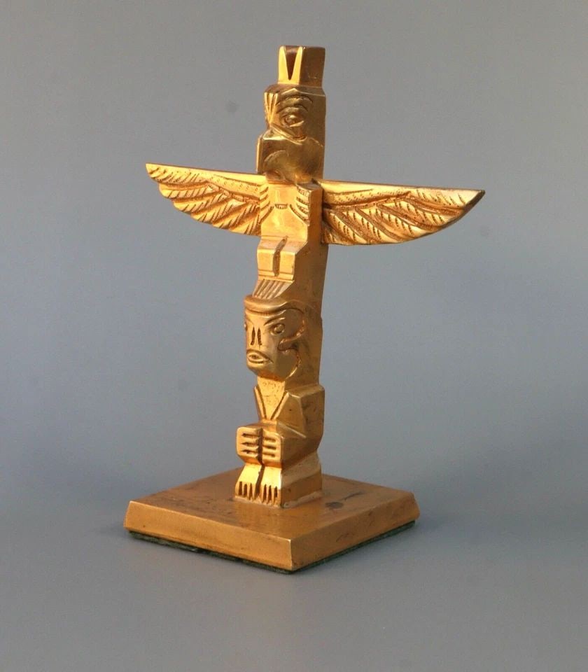 RALPH WILSON -NORTHWEST COAST-FIRST NATION-TOTEM POLE.. METAL WITH GOLD FINISH (1 of 2)