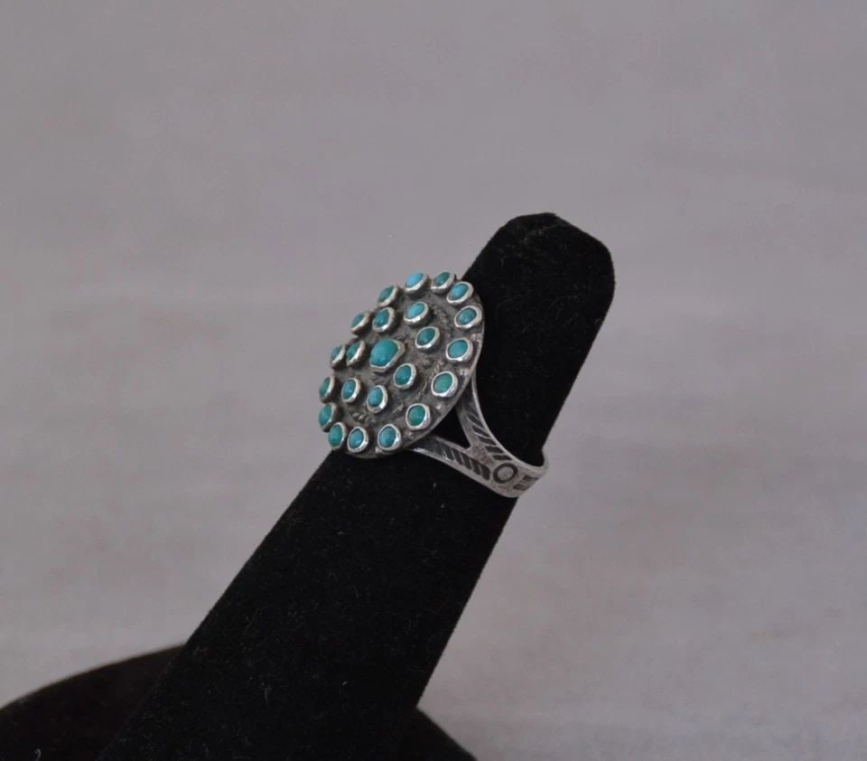 OLD PAWN ZUNI STERLING SILVER RING - SNAKE EYE TURQUOISE STONES - SZ 4: This vintage Zuni ring has been set with delicately handcrafted snake eye turquoise stones. The front of the ring measures 3/4" tall. The ring size is 4. This vintage Zuni ring is in great condition. 