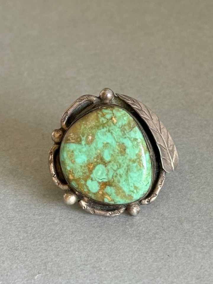 OLD PAWN NAVAJO STERLING SILVER AND TURQUOISE RING. SIZE 5: OLD PAWN NAVAJO STERLING SILVER AND TURQUOISE RING. SIZE 5 Old Pawn Navajo Sterling Silver and Turquoise Ring. Size 5 ..1 " Tall 8.44 Grams
