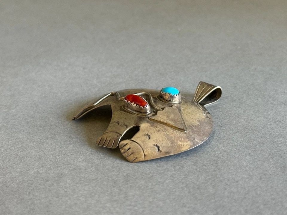 VINTAGE NAVAJO STERLING SILVER HEARTLINE BEAR PENDANT WITH TURQUOISE AND CORAL: VINTAGE NAVAJO STERLING SILVER HEARTLINE BEAR PENDANT WITH TURQUOISE AND CORAL Vintage Navajo Sterling Silver Heartline Bear Pendant with Turquoise and Coral 1 3/4" Tall x 1 7/8” Wide