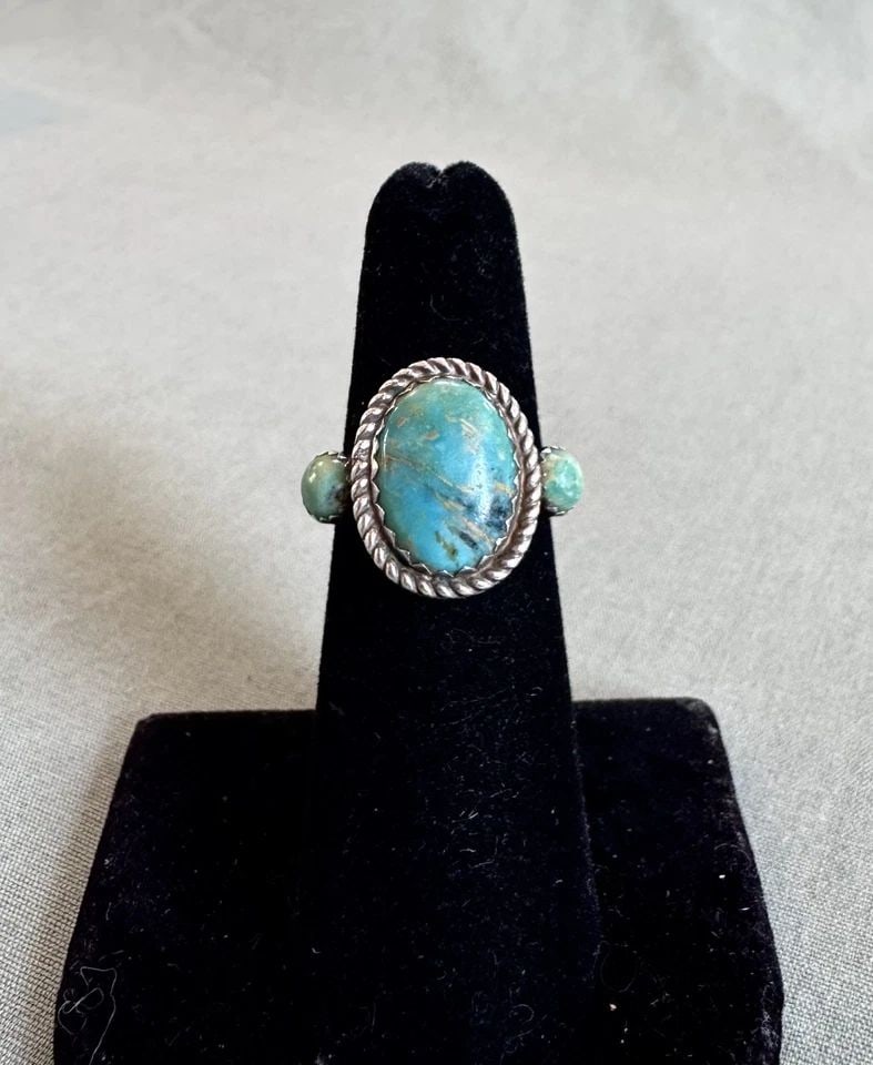 OLD PAWN NAVAJO STERLING SILVER AND TURQUOISE RING SIZE 5 3/4: OLD PAWN NAVAJO STERLING SILVER AND TURQUOISE RING SIZE 5 3/4 5/8 " Tall 5.7 Grams Ring Size 5 3/4 Throughout the 40 years that I have been in business, I have purchased jewelry from pawn shops throug