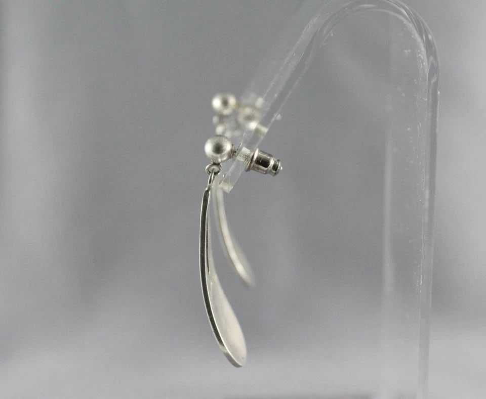 VINTAGE HOPI STERLING SILVER EARRINGS - DANGLES 1.5" DROP - CORN - M LOMAYAKTEWA: VINTAGE HOPI STERLING SILVER EARRINGS - DANGLES 1.5" DROP - CORN - M LOMAYAKTEWA Item Description: This pair of earrings have been beautifully crafted by Hopi silversmith Moody Lomayaktewa. They are s