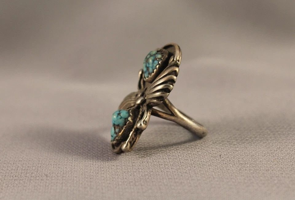 OLD PAWN NAVAJO STERLING SILVER INDIAN RING - 2 TURQUOISE STONES - SIZE 4 3/4: OLD PAWN NAVAJO STERLING SILVER INDIAN RING - 2 TURQUOISE STONES - SIZE 4 3/4 Item Description: 1 1/8” tall
