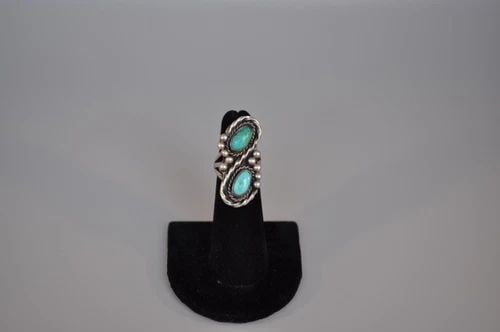 OLD PAWN NAVAJO SILVER RING - TURQUOISE SIZE 4 1/2: OLD PAWN NAVAJO SILVER RING - TURQUOISE SIZE 4 1/2 Weight 10.12 Grams 1 3/8" tall Old Pawn Jewelry dates from the early 1900s to the 1970s. Most of it is not signed because it wasn't the