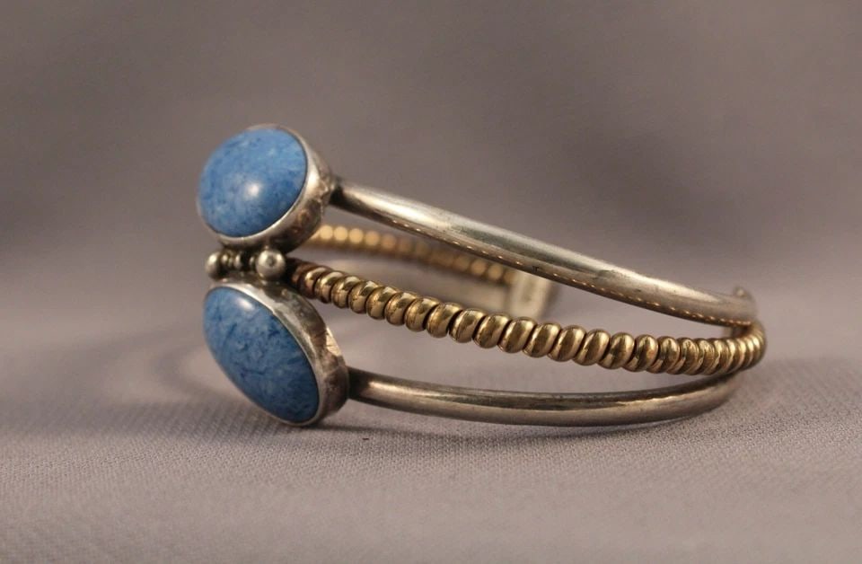 VINTAGE NAVAJO STERLING AND BLUE STONE BRACELET: Item : Vintage Navajo Bracelet 1 1/4" Wide .. 5 1/4" Inside with a 1 3/8" opening