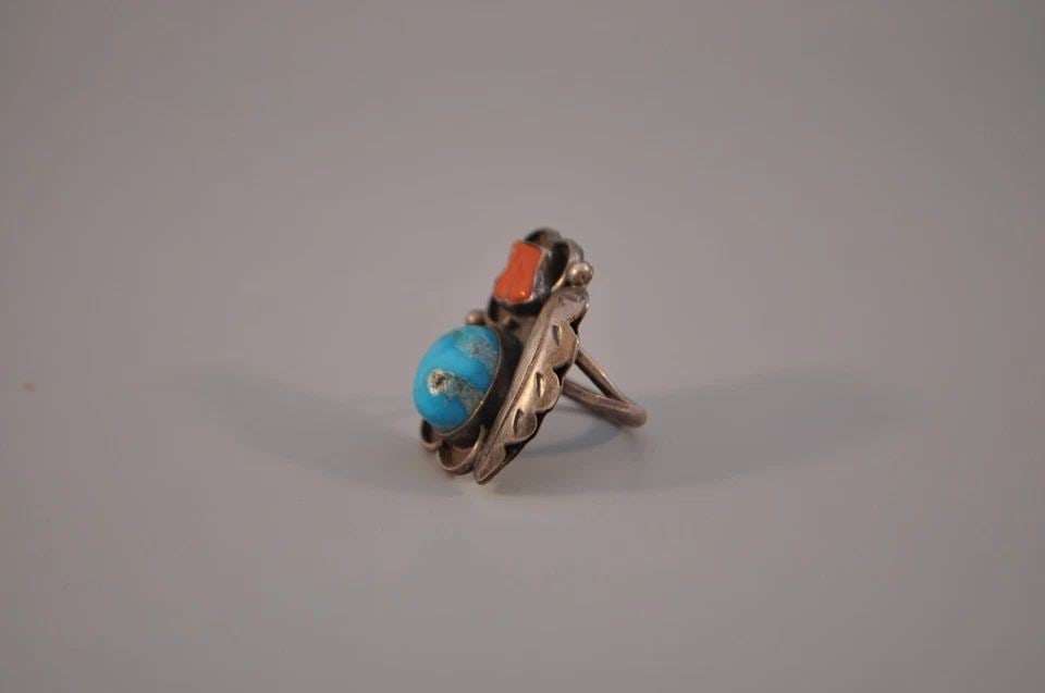 OLD PAWN NAVAJO STERLING SILVER RING - TURQUOISE /CORAL SIZE 6 1/2: OLD PAWN NAVAJO STERLING SILVER RING - TURQUOISE /CORAL SIZE 6 1/2 Weight 8.10 Grams 1 1/4" Tall Old Pawn Jewelry dates from the early 1900s to the 1970s. Most of it is not signed because it wasn't th