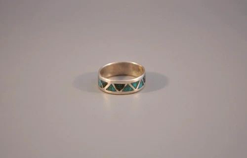OLD PAWN NAVAJO STERLING SILVER RING - TURQUOISE SIZE 11: OLD PAWN NAVAJO STERLING SILVER RING - TURQUOISE SIZE 11 Weight 5.10 Grams 1/4" Tall Old Pawn Jewelry dates from the early 1900s to the 1970s. Most of it is not signed because it wasn't the Native Ame