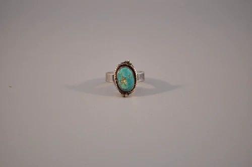 OLD PAWN NAVAJO STERLING SILVER RING - TURQUOISE SIZE 6: OLD PAWN NAVAJO STERLING SILVER RING - TURQUOISE SIZE 6 Weight 5.02 Grams 3/4" Tall Old Pawn Jewelry dates from the early 1900s to the 1970s. Most of it is not signed because it wasn't the Native Amer