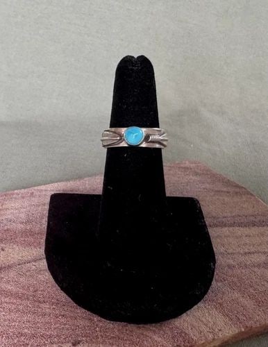 NAVAJO STERLING SILVER AND TURQUOISE RING SIGNED .. SIZE 6 1/4: NAVAJO STERLING SILVER AND TURQUOISE RING SIGNED .. SIZE 6 1/4 1/4" Wide .. Size 6 1/4 .. 6 grams Throughout the 40 years that I have been in business, I have purchased jewelry from pawn shops through