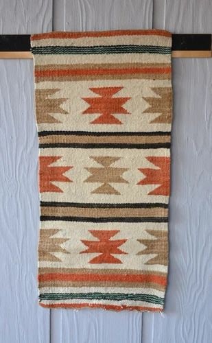VINTAGE NAVAJO RUG - WARM EARTH COLORS -: VINTAGE NAVAJO RUG - WARM EARTH COLORS - This vintage Navajo rug has been woven of handspun wools in warm earth colors. It measures 35" x 16". This rug is in fair condition. There is a prominent line 