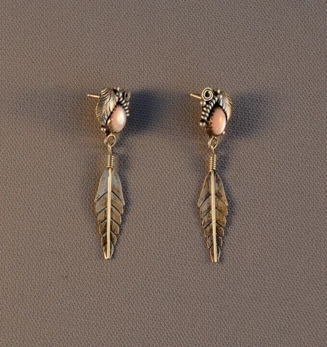 VINTAGE NAVAJO SILVER FEATHER DANGLE EARRINGS - PINK MOTHER OF PEARL SHELL - 2": VINTAGE NAVAJO SILVER FEATHER DANGLE EARRINGS - PINK MOTHER OF PEARL SHELL - 2" Item Description: This pair of Navajo earrings has been beautifully crafted. Silver feather dangles are surrounded with 