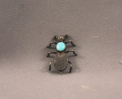 OLD PAWN NAVAJO STERLING SILVER AND TURQUOISE BUG PIN: OLD PAWN NAVAJO STERLING SILVER AND TURQUOISE BUG PIN Item Description: 1" Tall x 3/4" wide Black Patina from age ..would polish up fine ..
