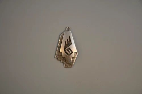 NAVAJO INDIAN 3 LAYER STERLING SILVER PENDANT - SPIRAL SYMBOL - SIGNED AKEE: Item : This vintage Navajo pendant is beautifully crafted with 3 layers of sterling silver. The pendant is 2" tall by 1" wide and weighs 7.33 grams. It is signed by the artist Akee and marked 925 for 