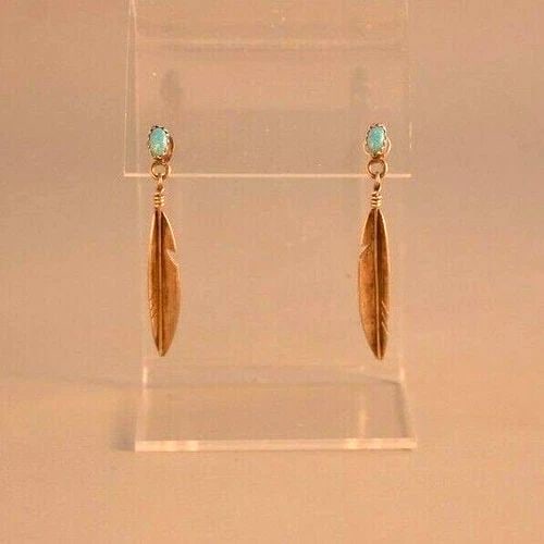 VINTAGE NAVAJO INDIAN STERLING SILVER FEATHER EARRINGS - BLUE OPAL - 1 3/4" DROP: VINTAGE NAVAJO INDIAN STERLING SILVER FEATHER EARRINGS - BLUE OPAL - 1 3/4" DROP Item Description: This pair of Navajo sterling silver earrings have been set with blue opal stones and measure 1 3/4" l