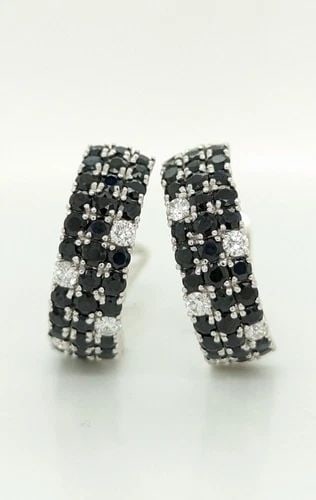 ROBERTO COIN FANTASIA 18K WHITE GOLD DIAMOND BLACK SAPPHIRE HALF HOOP EARRINGS: ROBERTO COIN FANTASIA 18K WHITE GOLD DIAMOND BLACK SAPPHIRE OMEGA BACK EARRINGS Roberto Coin Fantasia 18K White Gold Diamond & Black Sapphire Earrings Total Weight - 14.9 Grams Width - 8mm Length - 1"