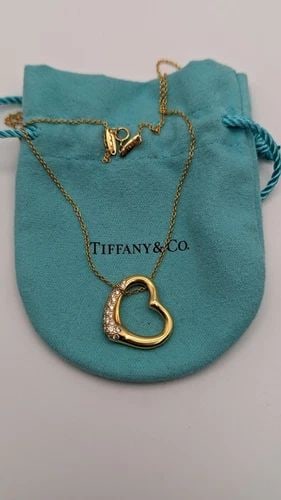 TIFFANY & CO 18K GOLD ELSA PERETTI .38CT DIAMOND OPEN HEART PENDANT NECKLACE 16": Tiffany & Co. 18K Yellow Gold Elsa Peretti Open Heart Diamond Pendant Necklace Length - 16" Pendant Size - 21mm Total Weight - 8.0 Gram Excellent Condition & Very Well Kept Pouch NOT Included