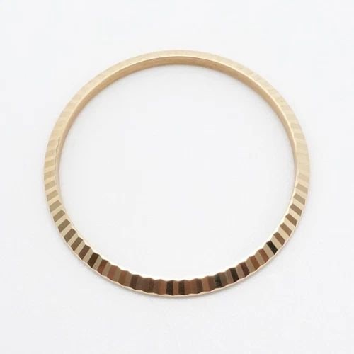 18K YELLOW GOLD FLUTED BEZEL FOR ROLEX PIECE PART - 34MM: 18K YELLOW GOLD FLUTED BEZEL FOR ROLEX PIECE PART - 34MM 18K Yellow Gold Fluted Bezel For Rolex Piece Part Bezel Size - 34mm Total Weight - 5.1 Grams