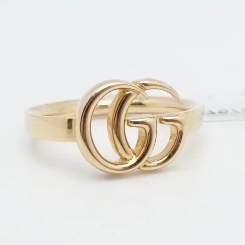 GUCCI 18K YELLOW GOLD GG LOGO RUNNING BAND RING - SIZE 15 US 7.25 WITH TAG: GUCCI 18K YELLOW GOLD GG LOGO RUNNING BAND RING - SIZE 15 US 7.25 WITH TAG Authentic GUCCI 18K Yellow Gold GG Logo Running Band Ring Size - 15 | US 7.25 Band Width - 2.5mm Logo Size (L X W) - 10mm x 1