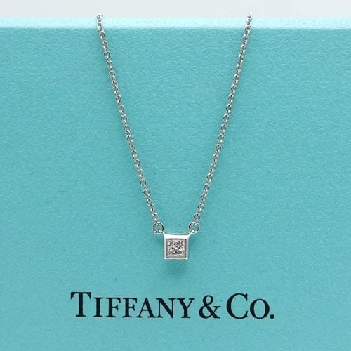 TIFFANY & CO. PLATINUM PRINCESS DIAMOND MINI PENDANT NECKLACE 16" BOX & RECEIPT: Tiffany & Co. Platinum Princess Diamond Mini Charm Pendant Necklace Length - 16" Pendant Width - 4mm Total Weight - 2.4 Grams Date of Purchase - 05/27/2011 Box, Case, & Proof of Purchase Included