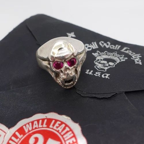 BILL WALL LEATHER STERLING SILVER RED STONE SECRET SKULL RING - SIZE 7.25 PAPER: BILL WALL LEATHER STERLING SILVER RED STONE SECRET SKULL RING - SIZE 7.25 PAPER Bill Wall Leather Sterling Silver Red Stone Secret Skull Heavy Ring Size - 7.25 Band Width - 6mm Height - 23mm Total Wei