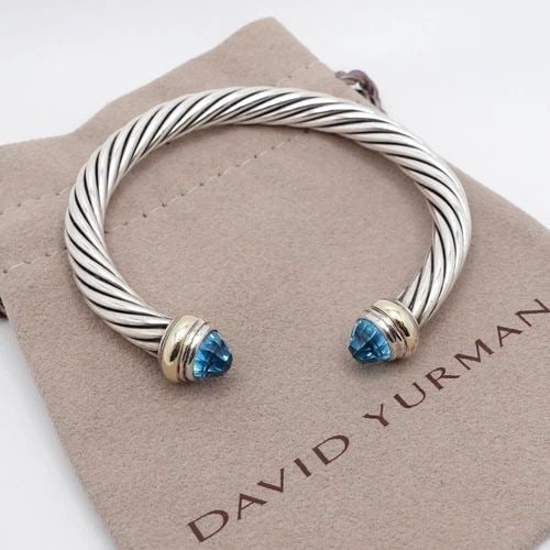 DAVID YURMAN STERLING SILVER 14K GOLD BLUE TOPAZ 7MM CABLE CUFF MEDIUM BRACELET: DAVID YURMAN STERLING SILVER 14K GOLD BLUE TOPAZ 7MM CLASSIC CABLE BRACELET David Yurman Sterling Silver & 14K Yellow Gold Blue Topaz Classic Cable Medium Ladies' Cuff Bracelet Fits up to 6 - 6.5" Wri