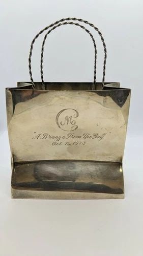 CARTIER STERLING SILVER HAND MADE SHOPPING BAG - 6.19 OZT ETCHED: Cartier Sterling Silver Hand Made Shopping Bag Total Weight - 6.19 Ozt Engraved On Both Sides " A Breeze From The Gulf " Oct 15, 1973 " Love from the Esplanades " Great Condition & Very Well Kept