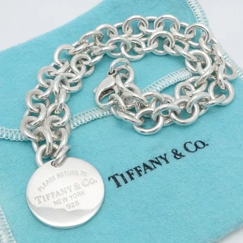 TIFFANY & CO. RETURN TO STERLING SILVER ROUND TAG 10MM CHAIN NECKLACE 16": TIFFANY & CO. RETURN TO STERLING SILVER ROUND TAG 10MM CHAIN NECKLACE 16" Tiffany & Co. Return to Tiffany Sterling Silver Round Tag Chain Necklace Length - 16" Long Chain Width - 10mm Chain Depth - 2m