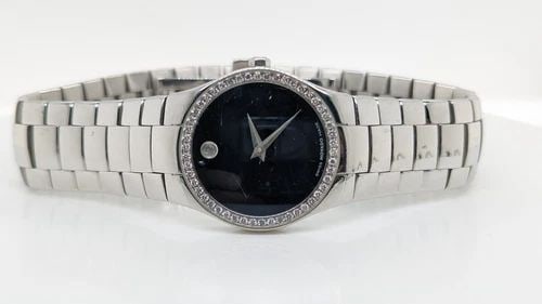 MOVADO STRATO 84 A1 2847 S BLACK DIAL DIAMOND BEZEL LADIES QUARTZ WATCH - 26 MM: MOVADO STRATO 84 A1 2847 S BLACK DIAL DIAMOND BEZEL LADIES QUARTZ WATCH - 26 MM Movado Strato Black Dial Diamond Bezel Women's Watch Reference - 84 A1 2847 S Case Size - 26mm Bracelet Fits up to a 7.2