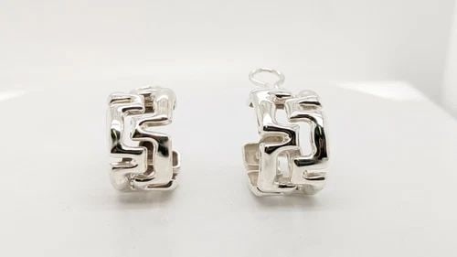 TIFFANY & CO. STERLING SILVER TEXTURED CLIP ON EARRINGS: Tiffany & Co. Sterling Silver Textured Clip On Earrings Width - 13mm Total Weight - 18.5 Grams Professionally Polished & Looks Brand New Pouch Not Included *** Check My Other Listing for Matching Cuff