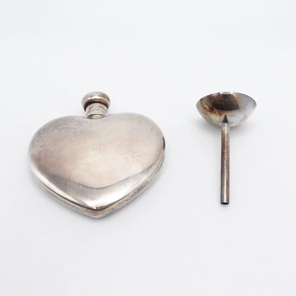 TIFFANY & CO. STERLING SILVER HEART SHAPED PERFUME BOTTLE FUNNEL SET - BOX #Q2: Vintage Tiffany & Co. Sterling Silver Heart Shaped Perfume Bottle & Funnel Set Size - 1.65" x 1.65"42mm Depth - 8mm Total Weight - 20.4 Grams With Box Included Great Vintage & Well-Kept
