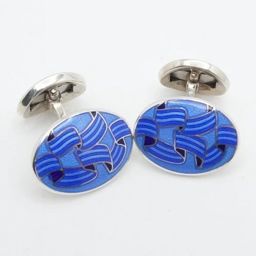 BIRMINGHAM STERLING SILVER BLUE ENAMEL OVAL ENGLISH CUFFLINKS: BIRMINGHAM STERLING SILVER BLUE ENAMEL OVAL ENGLISH CUFFLINKS Birmingham Sterling Silver Blue Enamel Oval Cufflinks Size - 19mm x 14mm Total Weight - 13.7 Grams Hallmark - 925 *Birmingham side anchor*