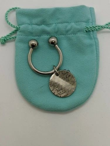 TIFFANY & CO. TITANIUM WAVY NOTES FIFTH AVENUE NY ROUND TAG KEY RING (1 of 2)