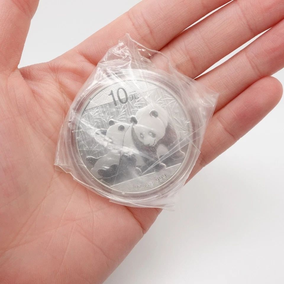 2011 CHINA PANDA SILVER 10 YUAN COIN - CAPSULATED & SEALED #Q4: 2011 CHINA PANDA SILVER 10 YUAN COIN - CAPSULATED & SEALED #Q4 2011 China Panda Silver 10 Yuan Coin Looks Great Capsulated & Sealed **Coins have not been opened or touched from their capsule. Please n